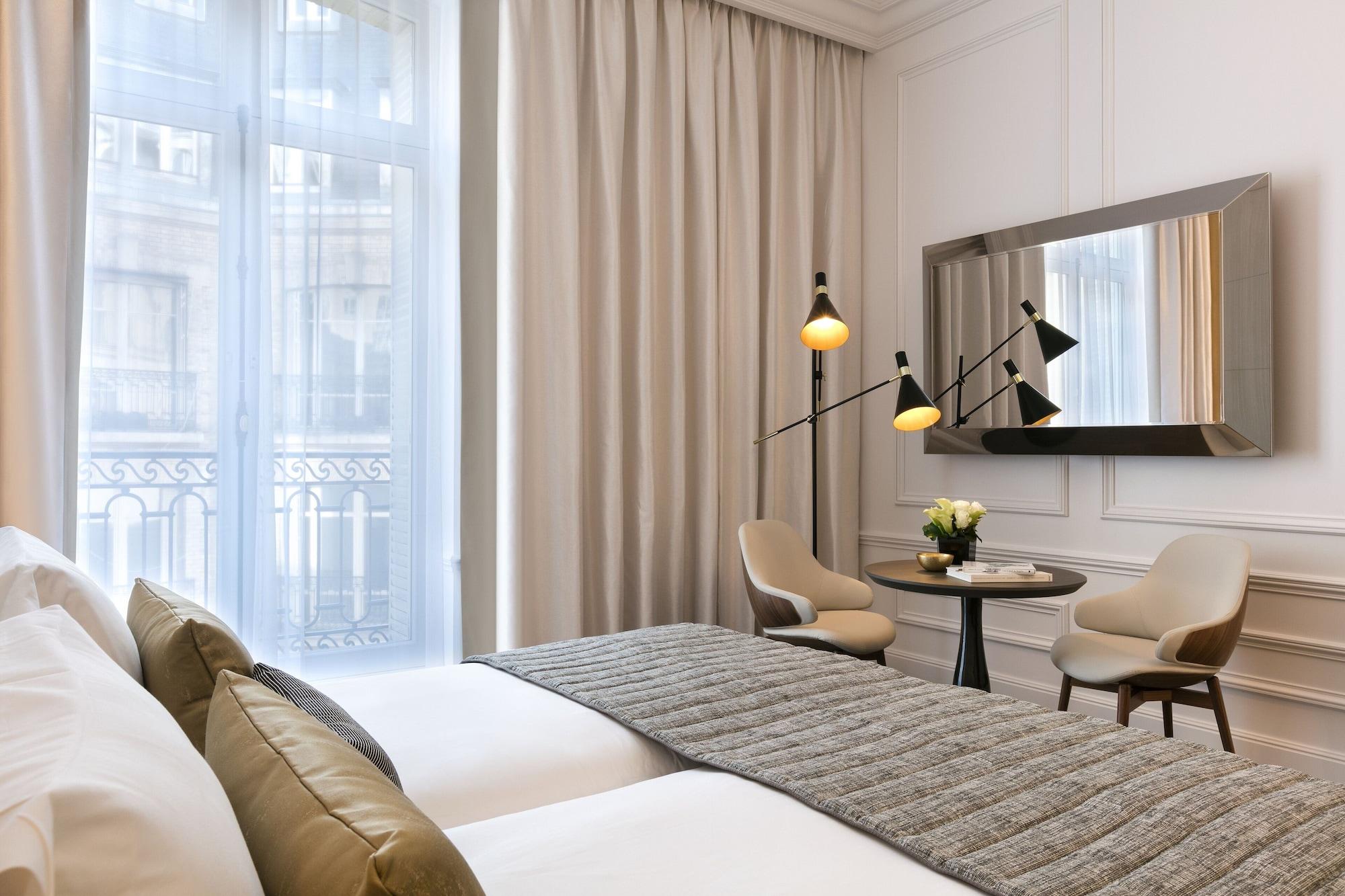 ลา เคลฟ ชองเซลิเซ ปารีส บาย เดอะ เครสต์ คอลเลคชั่น Hotel ภายนอก รูปภาพ A room at the hotel