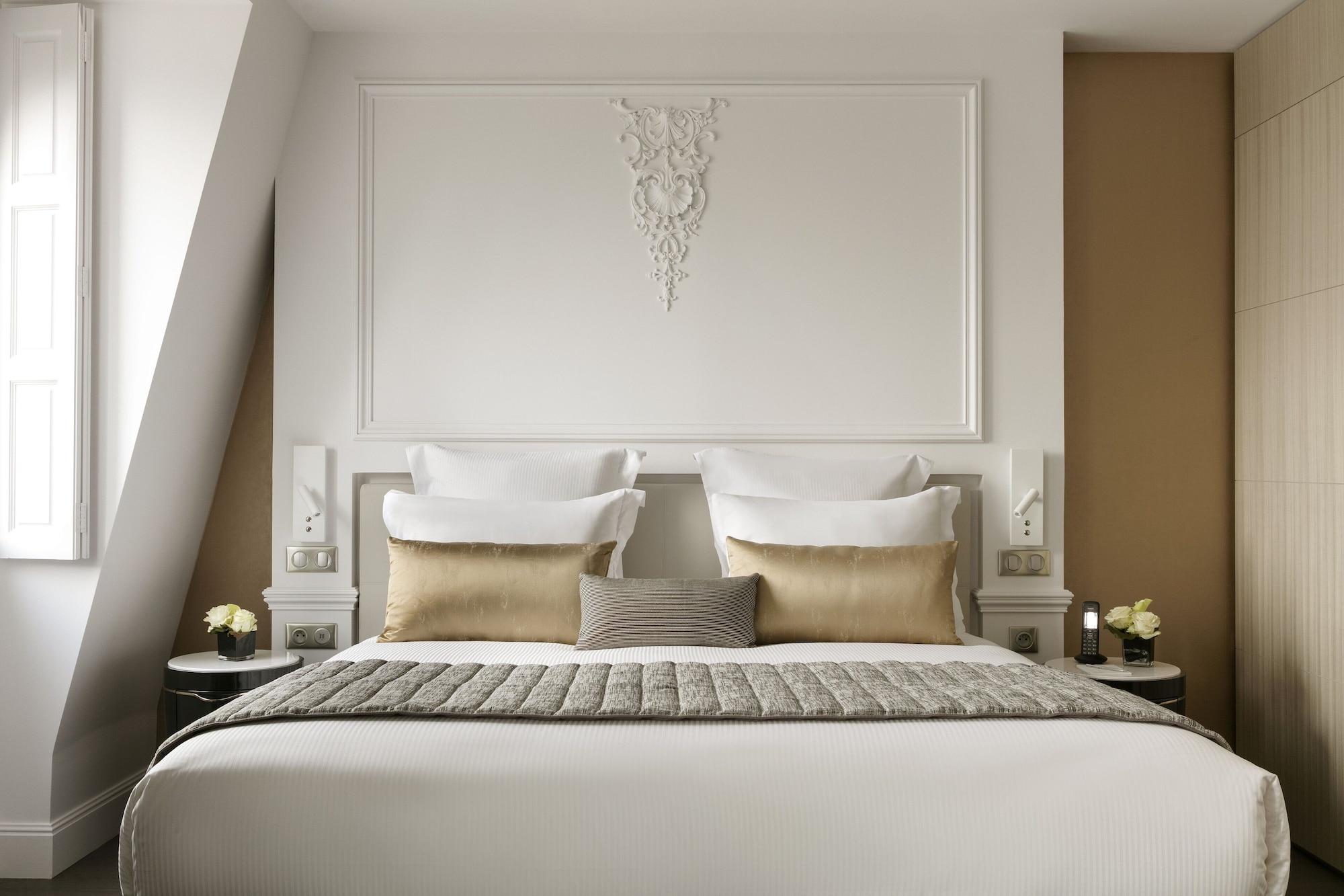 ลา เคลฟ ชองเซลิเซ ปารีส บาย เดอะ เครสต์ คอลเลคชั่น Hotel ภายนอก รูปภาพ A bedroom at the hotel