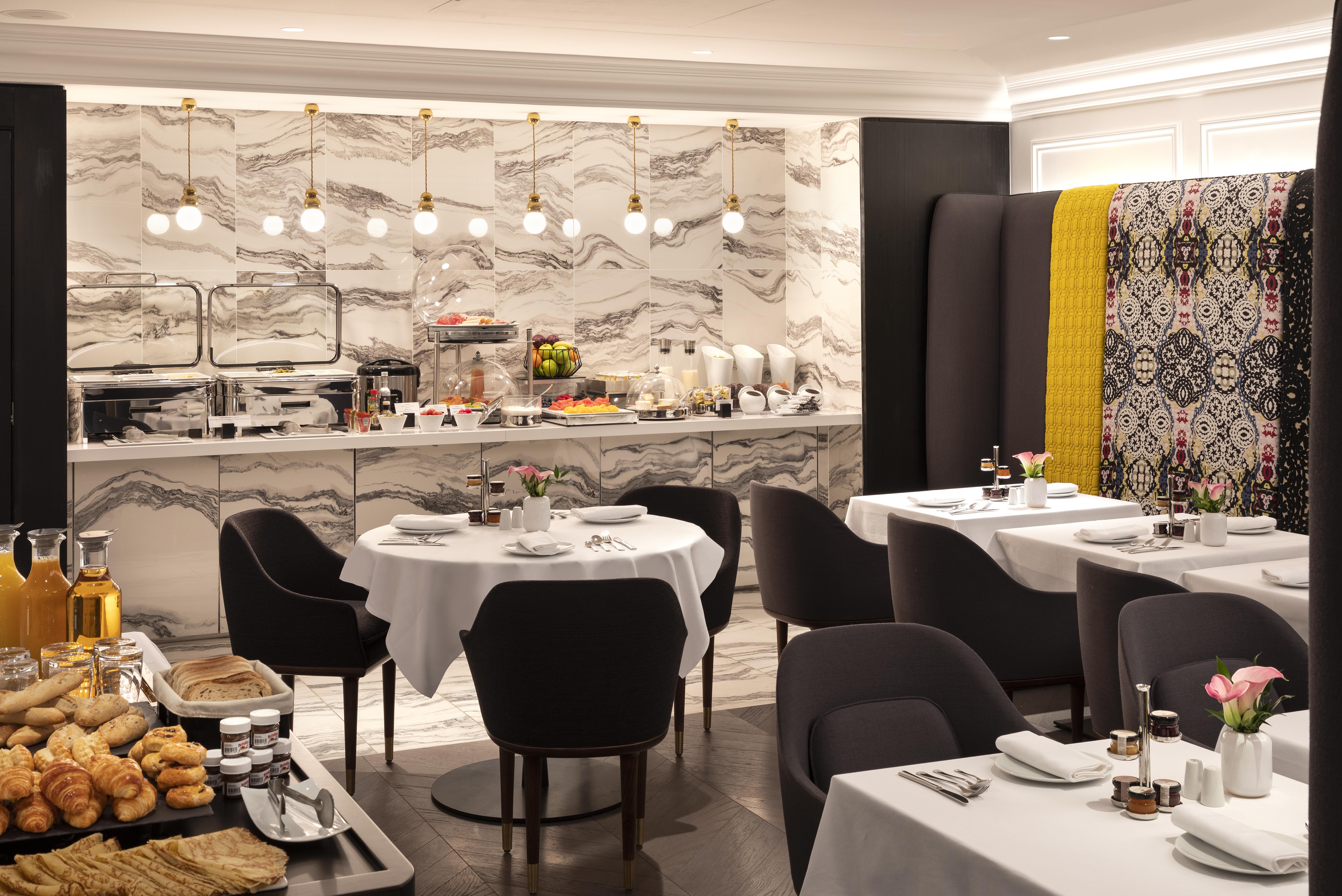 ลา เคลฟ ชองเซลิเซ ปารีส บาย เดอะ เครสต์ คอลเลคชั่น Hotel ภายนอก รูปภาพ The restaurant