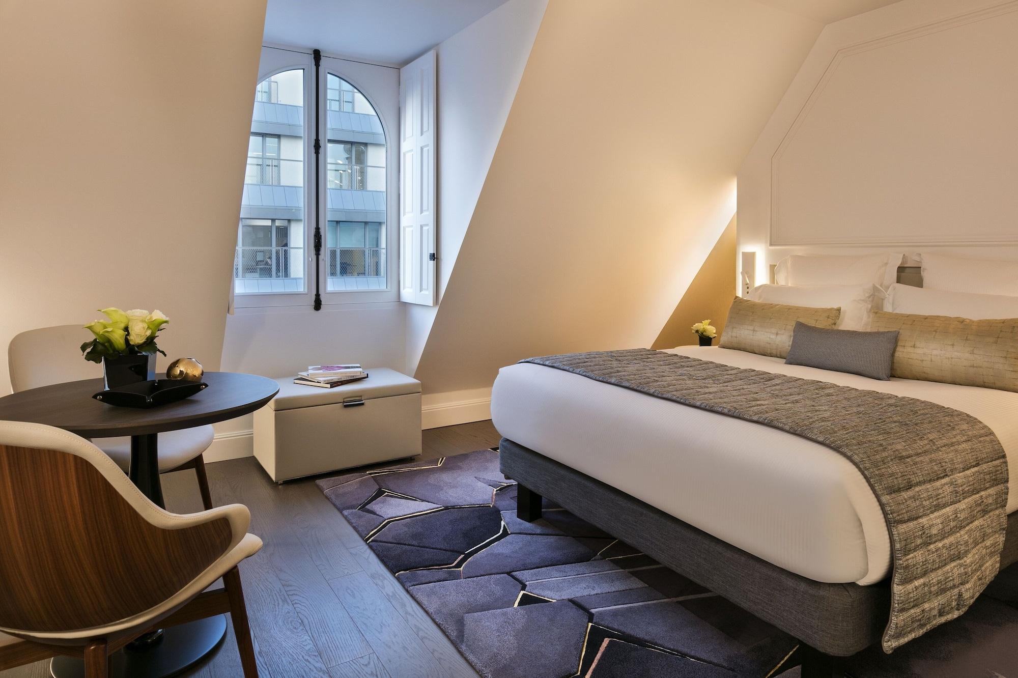 ลา เคลฟ ชองเซลิเซ ปารีส บาย เดอะ เครสต์ คอลเลคชั่น Hotel ภายนอก รูปภาพ A room at the hotel